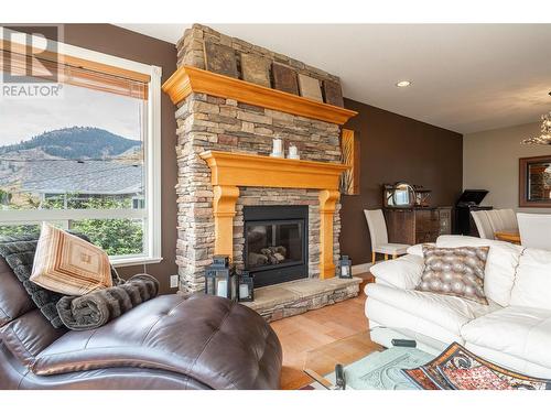 7551 Tronson Road, Vernon, BC - Indoor Photo Showing Living Room With Fireplace