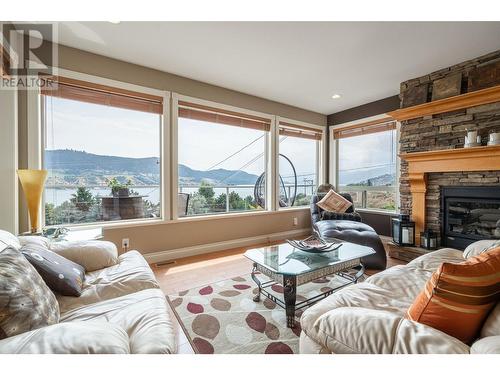 7551 Tronson Road, Vernon, BC - Indoor Photo Showing Living Room With Fireplace