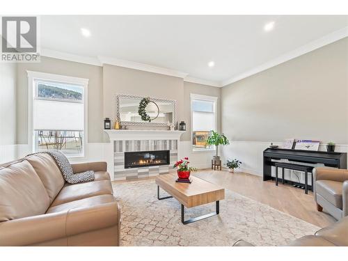 2699 Ridgemount Drive, West Kelowna, BC - Indoor Photo Showing Living Room With Fireplace