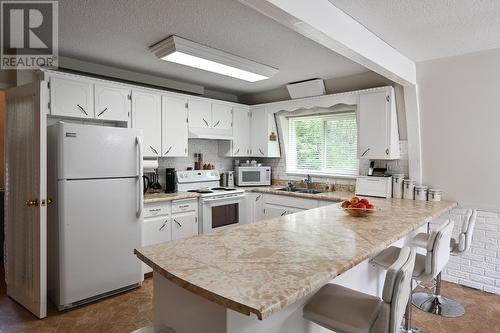 14495 E Shelley Road, Prince George, BC - Indoor Photo Showing Kitchen With Double Sink