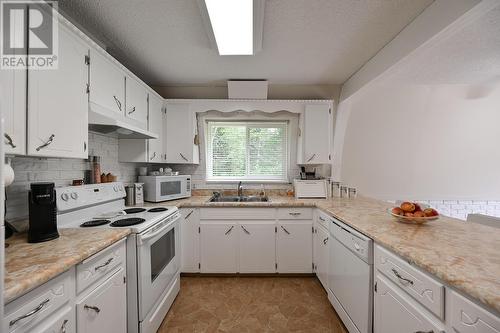 14495 E Shelley Road, Prince George, BC - Indoor Photo Showing Kitchen With Double Sink