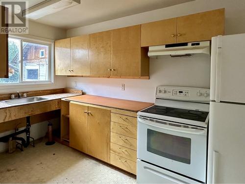 157 Mcconachie Creek Road, Fort Nelson, BC - Indoor Photo Showing Kitchen With Double Sink