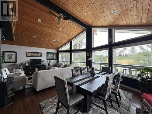 5212 Kallum Drive, 108 Mile Ranch, BC - Indoor Photo Showing Dining Room With Fireplace