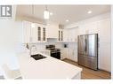 407 4274 22Nd Avenue, Prince George, BC  - Indoor Photo Showing Kitchen With Double Sink With Upgraded Kitchen 