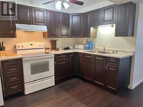 A & B 144 Cameron Street, Williams Lake, BC - Indoor Photo Showing Kitchen With Double Sink