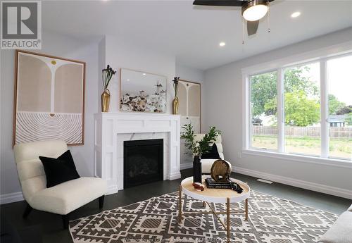 47 Belleview, Kingsville, ON - Indoor Photo Showing Living Room With Fireplace