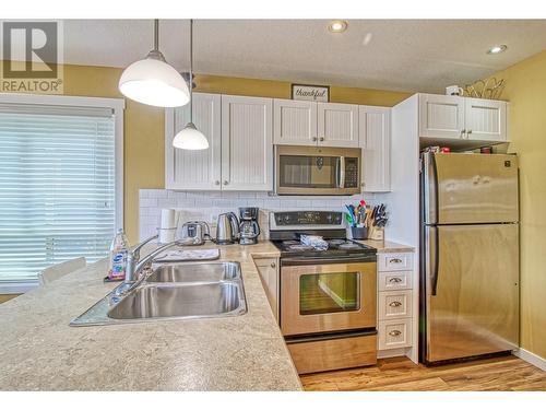 6859 Santiago Loop Lot# 121, Kelowna, BC - Indoor Photo Showing Kitchen With Double Sink