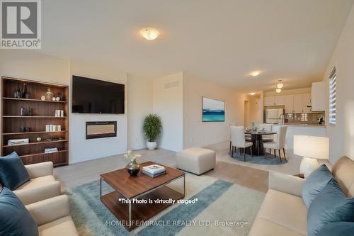 8 Beatrice Drive, Wasaga Beach, ON - Indoor Photo Showing Living Room With Fireplace