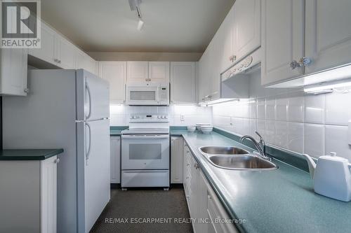 501 - 2085 Amherst Heights Drive, Burlington (Brant Hills), ON - Indoor Photo Showing Kitchen With Double Sink