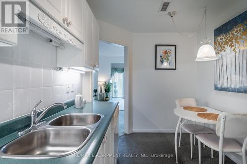 501 - 2085 Amherst Heights Drive, Burlington (Brant Hills), ON - Indoor Photo Showing Kitchen With Double Sink