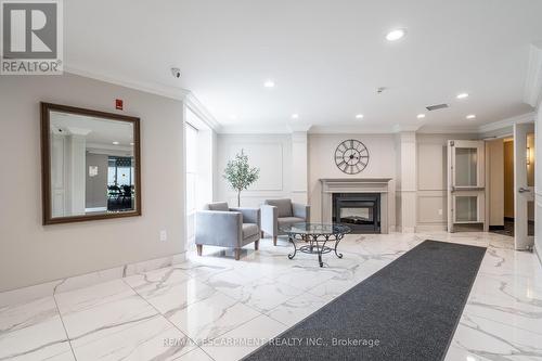 501 - 2085 Amherst Heights Drive, Burlington (Brant Hills), ON - Indoor With Fireplace