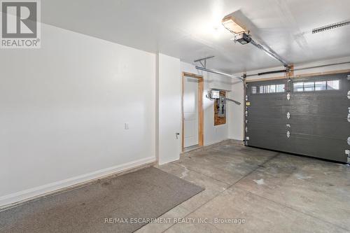 29 - 1169 Garner Road E, Hamilton (Ancaster), ON - Indoor Photo Showing Garage