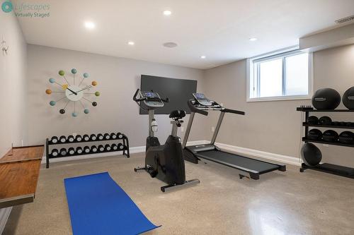 Same Spare Room Yet This Time Virtually Staged As A Home Gym With Convenient 3 Pc Bathroom Attached - 147 Mountain Park Avenue, Hamilton, ON - Indoor Photo Showing Gym Room