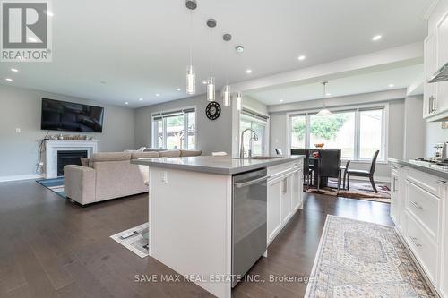 124 Drexler Avenue, Guelph/Eramosa (Rockwood), ON - Indoor Photo Showing Kitchen With Fireplace With Upgraded Kitchen