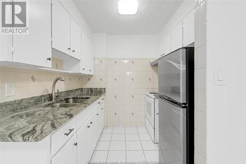 6599 Thornberry, Windsor, ON - Indoor Photo Showing Kitchen With Double Sink