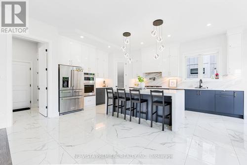 42 Poole Crescent, Middlesex Centre (Komoka), ON - Indoor Photo Showing Kitchen With Upgraded Kitchen