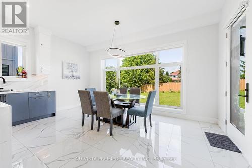 42 Poole Crescent, Middlesex Centre (Komoka), ON - Indoor Photo Showing Dining Room