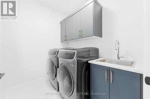 42 Poole Crescent, Middlesex Centre (Komoka), ON - Indoor Photo Showing Laundry Room