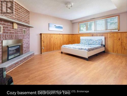 51 Beck Boulevard, Penetanguishene, ON - Indoor Photo Showing Bedroom With Fireplace