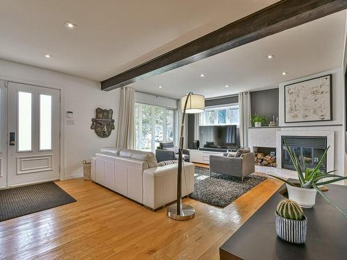 Living room - 455 Rue Du Baron, Saint-Sauveur, QC - Indoor Photo Showing Living Room With Fireplace