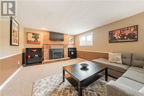 83 Forestgate Drive, Hamilton (Fessenden), ON - Indoor Photo Showing Living Room With Fireplace