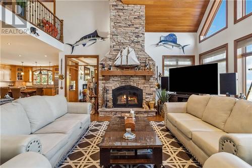 31 Edgewater Lane, Little Shemogue, NB - Indoor Photo Showing Living Room With Fireplace