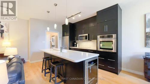 5 Oakwood Links Lane, Lambton Shores (Grand Bend), ON - Indoor Photo Showing Kitchen With Stainless Steel Kitchen With Upgraded Kitchen