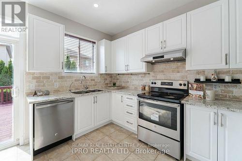 Upper - 1016 Mccuaig Drive, Milton (Clarke), ON - Indoor Photo Showing Kitchen With Stainless Steel Kitchen With Double Sink With Upgraded Kitchen