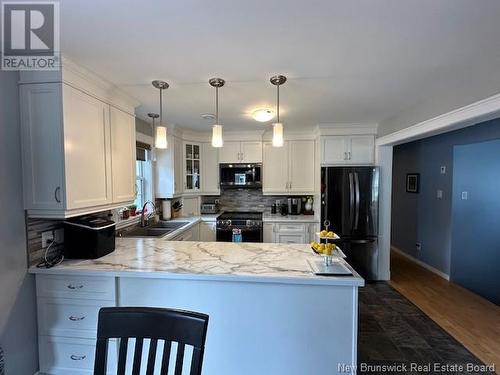 55 Duncan Street, Tide Head, NB - Indoor Photo Showing Kitchen With Double Sink