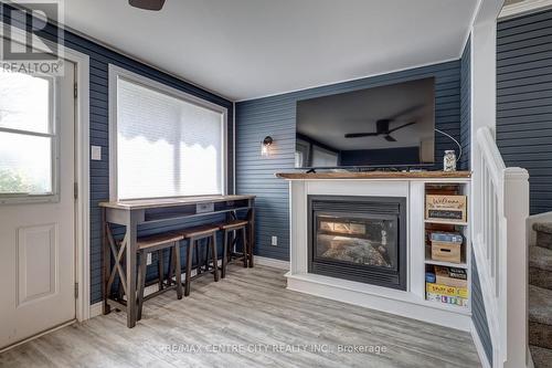 417A Edith Cavell Boulevard, Central Elgin (Port Stanley), ON - Indoor Photo Showing Living Room With Fireplace