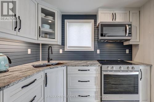 417A Edith Cavell Boulevard, Central Elgin (Port Stanley), ON - Indoor Photo Showing Kitchen With Double Sink