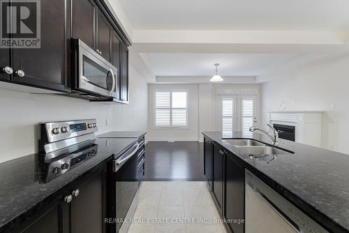 84 Heming Trail, Hamilton (Ancaster), ON - Indoor Photo Showing Kitchen With Double Sink