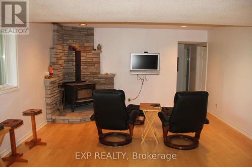 82739 Hunter'S Road N, Ashfield-Colborne-Wawanosh, ON - Indoor With Fireplace