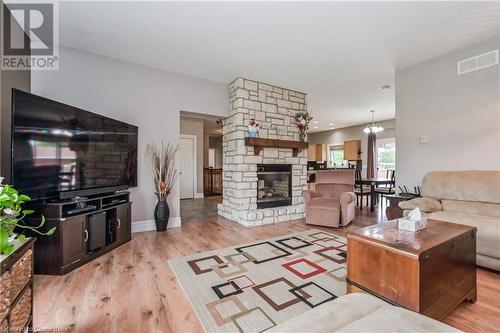 27 Highland Road, Clifford, ON - Indoor Photo Showing Living Room With Fireplace