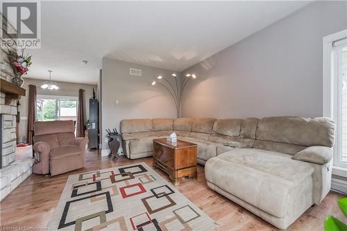 27 Highland Road, Clifford, ON - Indoor Photo Showing Living Room With Fireplace