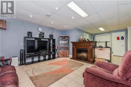 27 Highland Road, Clifford, ON - Indoor Photo Showing Living Room With Fireplace