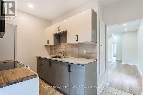 92 Ashley Street, Hamilton (Landsdale), ON - Indoor Photo Showing Kitchen With Double Sink