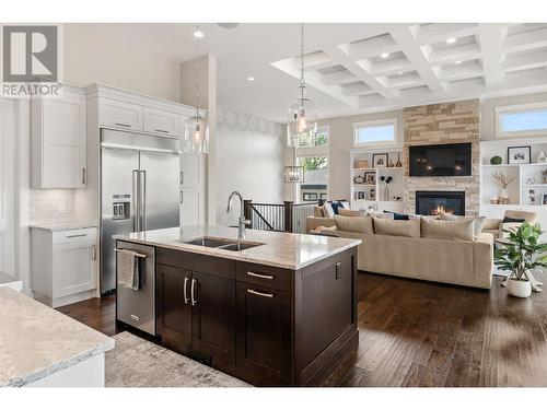 1535 Rocky Point Drive, Kelowna, BC - Indoor Photo Showing Kitchen With Fireplace With Double Sink With Upgraded Kitchen