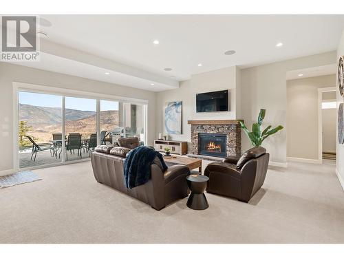 1535 Rocky Point Drive, Kelowna, BC - Indoor Photo Showing Living Room With Fireplace