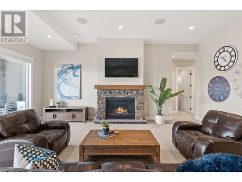 1535 Rocky Point Drive, Kelowna, BC - Indoor Photo Showing Living Room With Fireplace