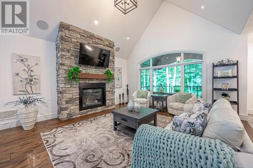 28 Heron Boulevard, Springwater (Snow Valley), ON - Indoor Photo Showing Living Room With Fireplace