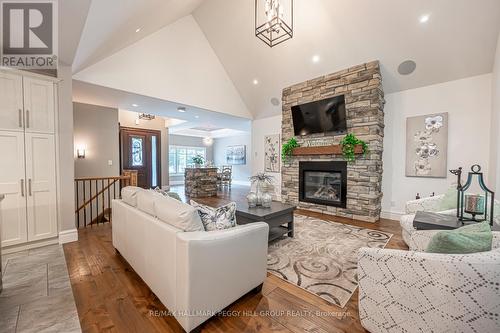 28 Heron Boulevard, Springwater (Snow Valley), ON - Indoor Photo Showing Living Room With Fireplace