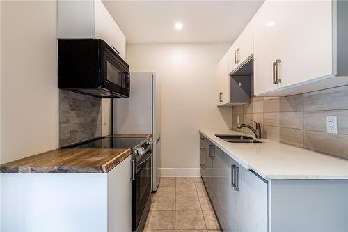 92 Ashley Street, Hamilton, ON - Indoor Photo Showing Kitchen With Double Sink