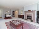 256-4488 Chatterton Way, Saanich, BC  - Indoor Photo Showing Living Room With Fireplace 