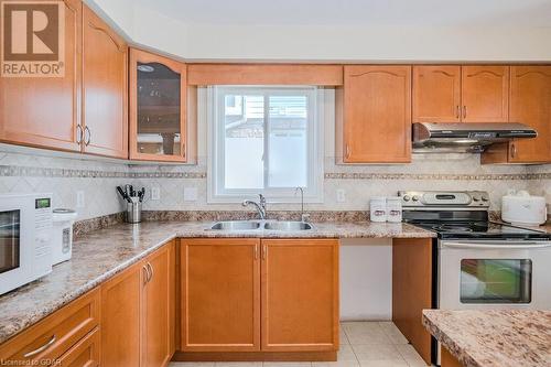 67 Revell Dr Drive, Guelph, ON - Indoor Photo Showing Kitchen With Double Sink