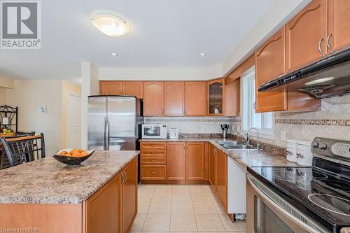 67 Revell Dr Drive, Guelph, ON - Indoor Photo Showing Kitchen With Double Sink