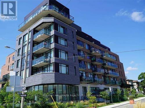 310 - 25 Malcolm Road, Toronto (Leaside), ON - Outdoor With Balcony With Facade