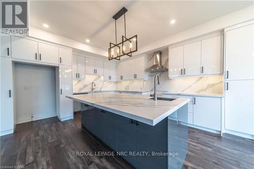 7903 Mulhern Street, Niagara Falls, ON - Indoor Photo Showing Kitchen With Double Sink