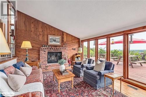 795310 The Blue Mtns - Clearview, Blue Mountains, ON - Indoor Photo Showing Living Room With Fireplace