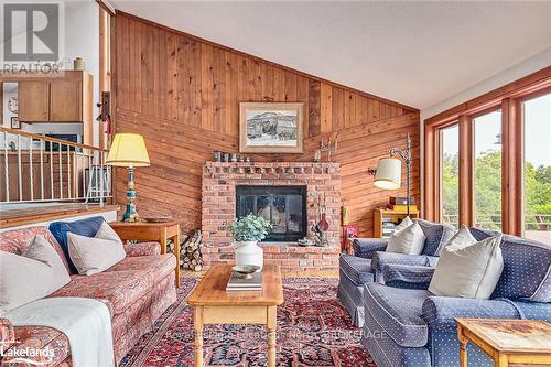 795310 The Blue Mtns - Clearview, Blue Mountains, ON - Indoor Photo Showing Living Room With Fireplace